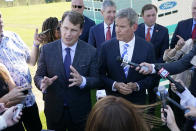 Jim Farley, Ford president and CEO, center left, along with Tennessee Gov. Bill Lee, center right, answers questions along with after a presentation on the planned factory to build electric F-Series trucks and the batteries to power future electric Ford and Lincoln vehicles Tuesday, Sept. 28, 2021, in Memphis, Tenn. The plant in Tennessee is to be built near Stanton, Tenn. (AP Photo/Mark Humphrey)