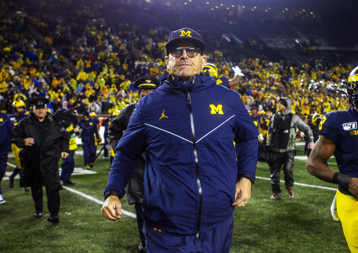 Michigan head coach Jim Harbaugh has had just moderate success in his six seasons as UM's coach. (AP Photo/Tony Ding)