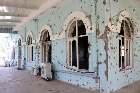 Bullet holes are seen on the wall of a mosque at the military headquarters where the Taliban attack occurred last week in Mazar-i-Sharif, northern Afghanistan April 25, 2017. REUTERS/Stringer