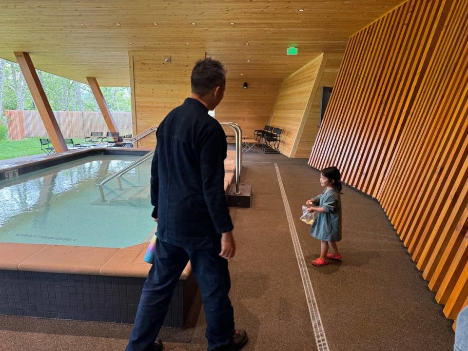 Yuichi Uchida and daughter Keto explore the hot pool at Snow Peak’s Campfield Long Beach’s spa.