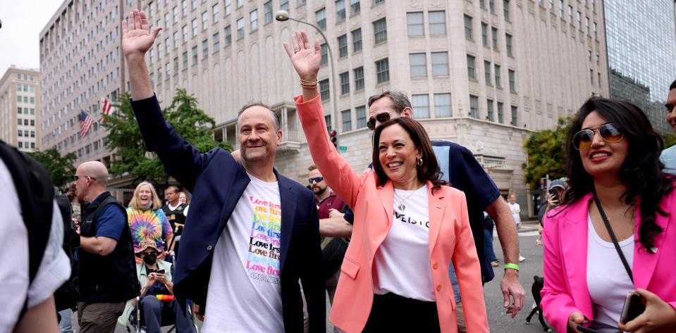 WASHINGTON, DC - JUNE 12: U.S. Vice President Kamala Harris and husband Doug Emhoff wave as they join marchers for the Capital Pride Parade on June 12, 2021 in Washington, DC. Capital Pride returned to Washington DC, after being canceled last year due to the Covid-19 pandemic. (Photo by Anna Moneymaker/Getty Images)