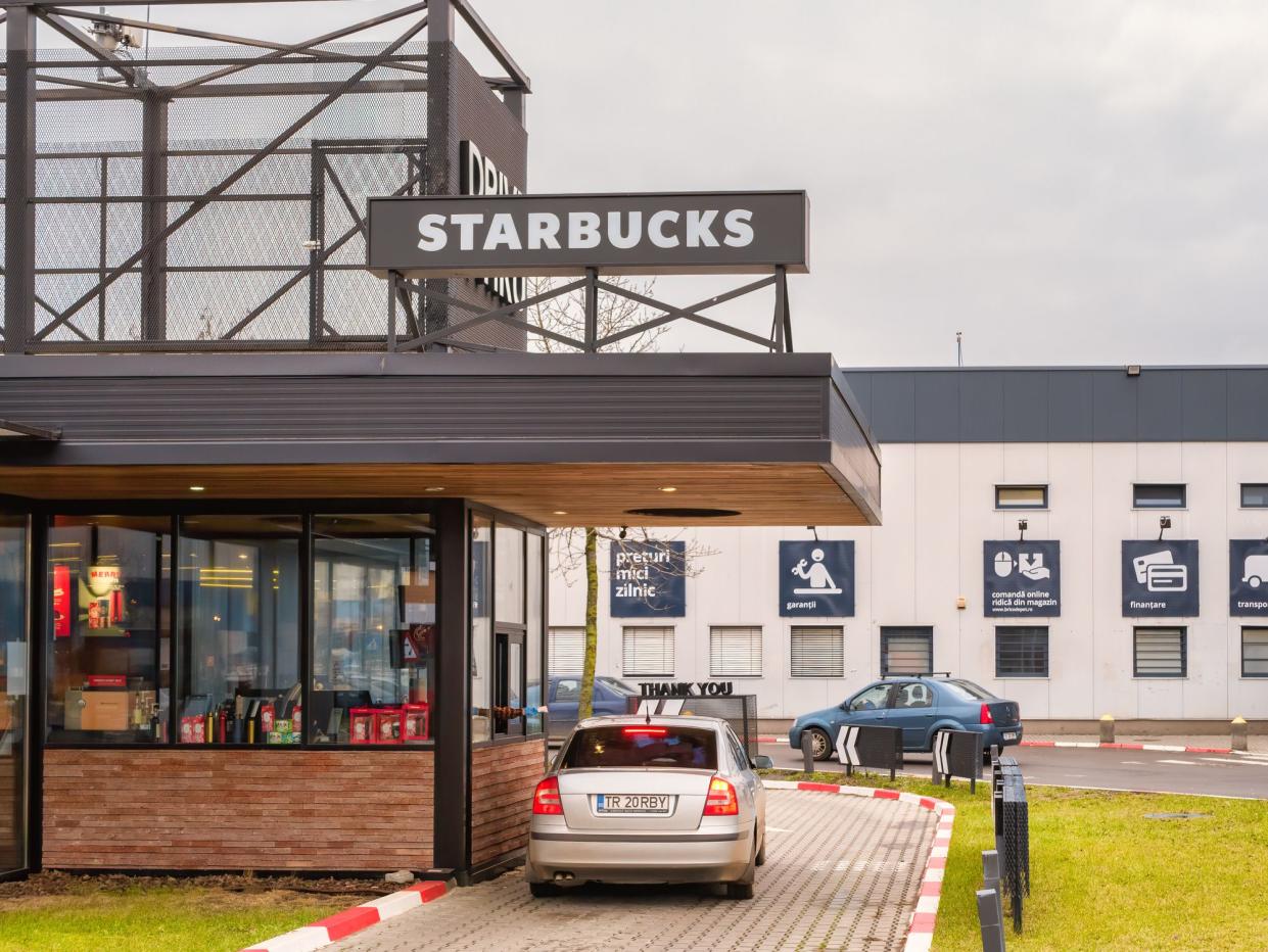 Bucharest Romania - 12.21.2020: Starbucks coffeehouse chain Drive Thru in Bucharest Romania