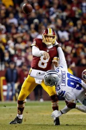 Washington Redskins quarterback Kirk Cousins (8) throws the ball as Dallas Cowboys defensive end Demarcus Lawrence (90) defends in the third quarter at FedEx Field. The Cowboys won 19-16. Mandatory Credit: Geoff Burke-USA TODAY Sports