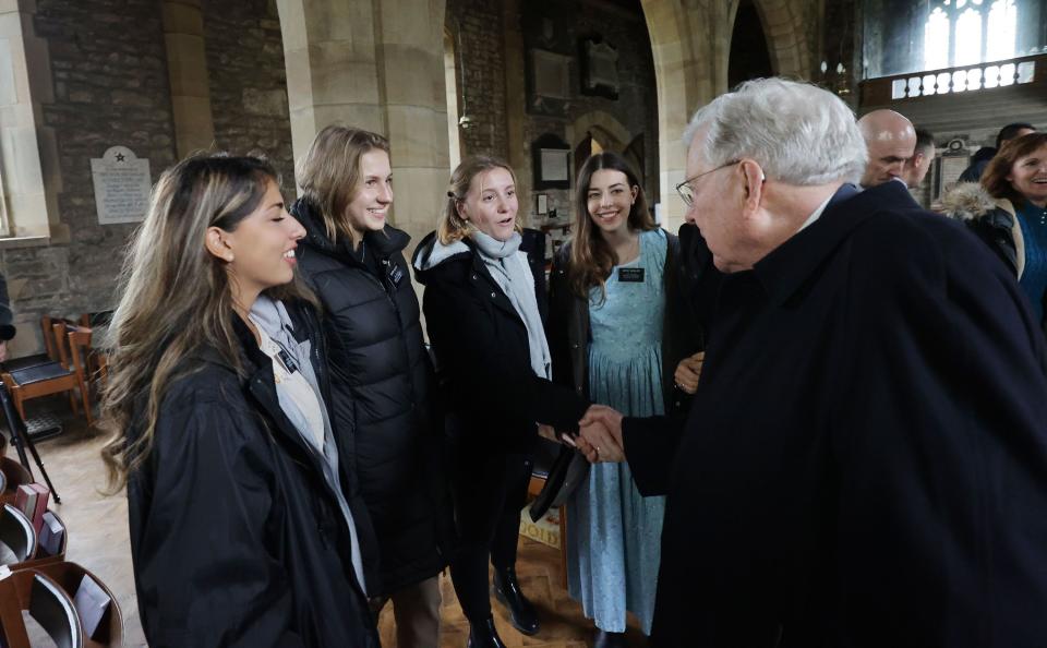 President M. Russell Ballard greets missionaries from the England Missionary Training Center at the Parish Church of Saint Leonard in Downham, England.