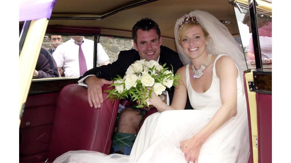 Gabby Logan and her husband Kenny in their wedding car