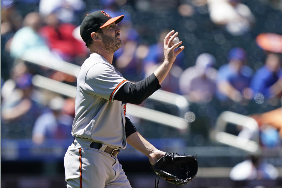 Baltimore Orioles starting pitcher Matt Harvey (32) reacts shortly before being taken out of the game during the fifth inning of a baseball game against the New York Mets, Wednesday, May 12, 2021, in New York. (AP Photo/Kathy Willens)