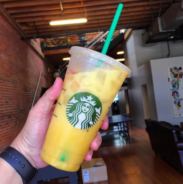 The Starbucks #OrangeDrink might be their tastiest rainbow creation yet