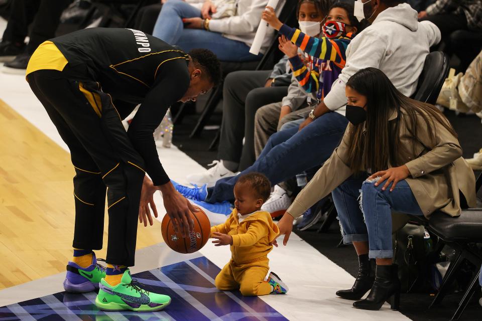 Giannis Antetokounmpo enjoys a moment with his son Liam before the All-Star Game Sunday night.