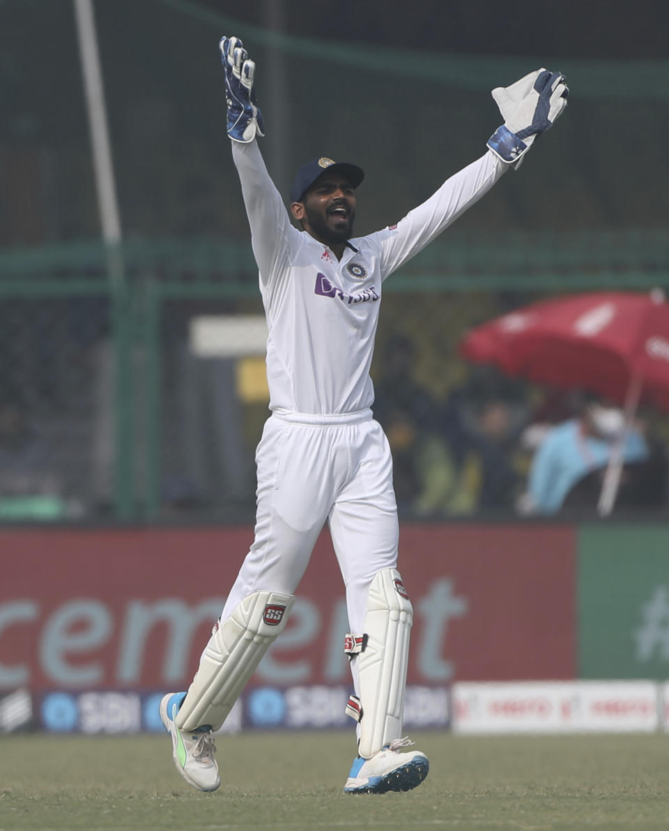 India's wicketkeeper KS Bharat appeal successfully against New Zealand's captain Kane Williamson during the day three of their first test cricket match in Kanpur, India, Saturday, Nov. 27, 2021. (AP Photo/Altaf Qadri)