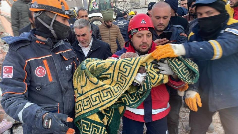 ADIYAMAN, TURKIYE - FEBRUARY 08: Two siblings, 7-month-old Omer and 9-year-old Muhammed Acar are rescued 58 hours after 7.7 and 7.6 magnitude earthquakes hit multiple provinces including Adiyaman, Turkiye on February 08, 2023. Early Monday morning, a strong 7.7 earthquake, centered in the Pazarcik district, jolted Kahramanmaras and strongly shook several provinces, including Gaziantep, Kahramanmaras, Diyarbakir, Adana, Adiyaman, Malatya, Osmaniye, Hatay, and Kilis. Later, at 13.24 p.m. (1024GMT), a 7.6 magnitude quake centered in Kahramanmaras' Elbistan district struck the region. Turkiye declared 7 days of national mourning after deadly earthquakes in southern provinces. (Photo by Ismail Kaya/Anadolu Agency via Getty Images)