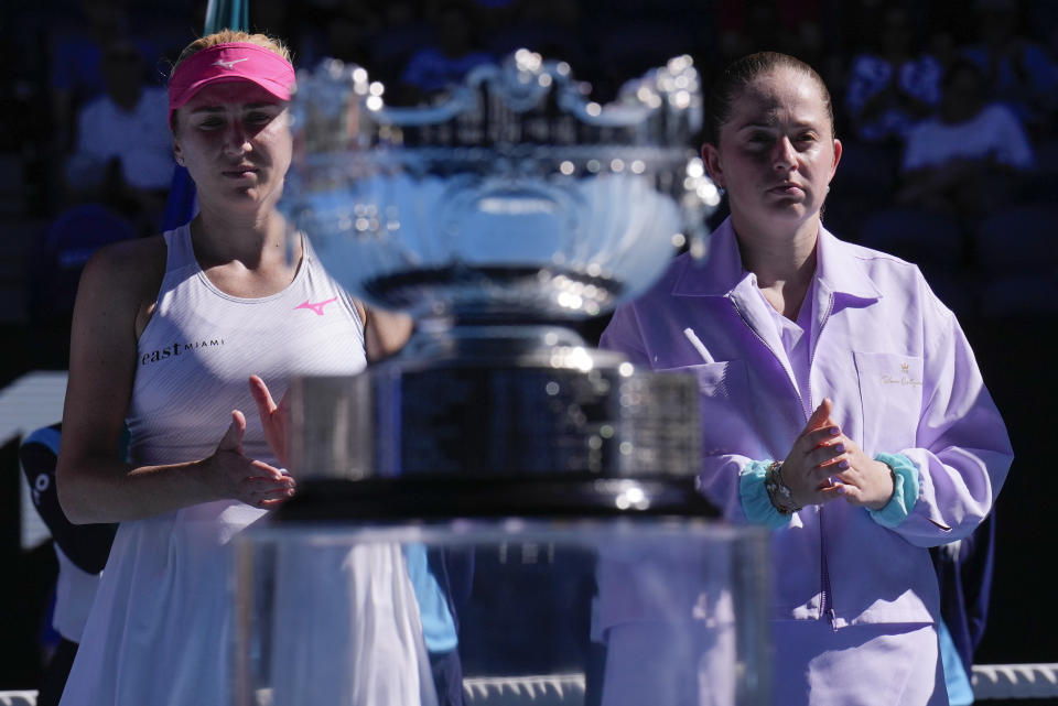 Jelena Ostapenko, right, of Latvia and Lyudmyla Kichenok of Ukraine react following their loss to Hsieh Su-Wei of Taiwan and Elise Mertens of Belgium in the women's doubles final at the Australian Open tennis championships at Melbourne Park, in Melbourne, Australia, Sunday, Jan. 28, 2024. (AP Photo/Andy Wong)