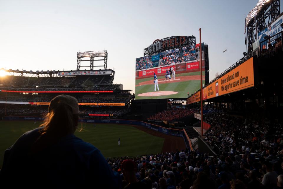 Fans and a large screen during a Mets vs.Phillies game at Citi Field on Wednesday, May 31, 2023.