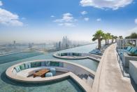 <p>If there's one thing that Dubai just loves, it's a superlative. However, you'll need a head for heights for a dip in the world's tallest infinity pool. Perched on the 77th floor of the uber-swish <a href="https://www.booking.com/hotel/ae/address-jumeirah-resort.en-gb.html?aid=2070929&label=best-hotels-dubai" rel="nofollow noopener" target="_blank" data-ylk="slk:Address Beach Resort;elm:context_link;itc:0;sec:content-canvas" class="link ">Address Beach Resort</a>, bold paddlers are rewarded with magnificent views over the Ain Dubai, the world's tallest observation wheel (naturally) and the Arabian Gulf. There's also a luxe spa – the most elevated in Dubai – on the 75th floor. </p><p>If you don't fancy getting your toes wet, try ZETA Seventy Seven, an Asian fusion restaurant next to the pool which has an open-air terrace and private cabanas, all with those views. Rooms are smart in every way, from floor-to-ceiling windows, neutral tones to the iPad controlled everything (apart from the views).</p><p><a class="link " href="https://www.booking.com/hotel/ae/address-jumeirah-resort.en-gb.html?aid=2070929&label=best-hotels-dubai" rel="nofollow noopener" target="_blank" data-ylk="slk:CHECK AVAILABILITY;elm:context_link;itc:0;sec:content-canvas">CHECK AVAILABILITY</a></p>