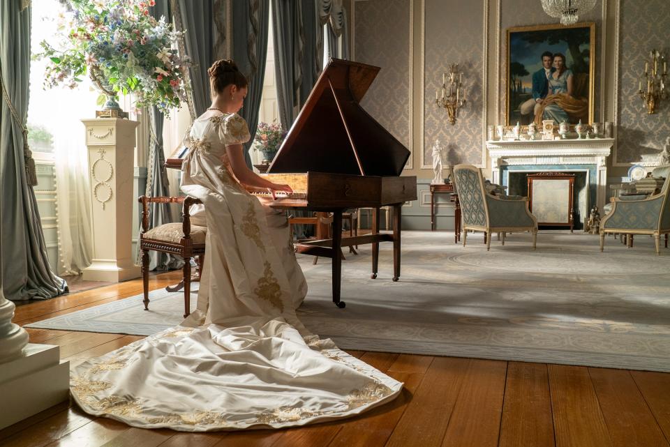 The Bridgerton family’s drawing and morning room, where the color palette is designed to reflect the clan’s “warm, friendly nature.” The piano, an original pianoforte, is very delicate and must be tuned by a specialist prior to each playing scene for the production.