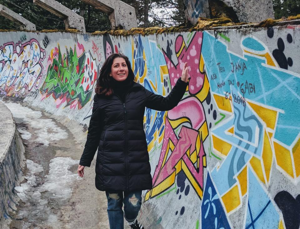 The author at the abandoned&nbsp;bobsled track in Sarajevo, the capital&nbsp;of Bosnia and Herzegovina. (Photo: Kristin Amico)