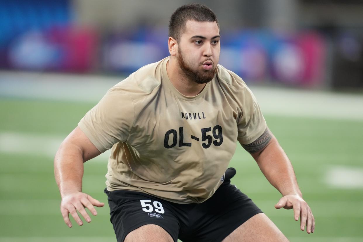 Mar 3, 2024; Indianapolis, IN, USA; Kansas offensive lineman Dominick Puni (OL59) during the 2024 NFL Combine at Lucas Oil Stadium.