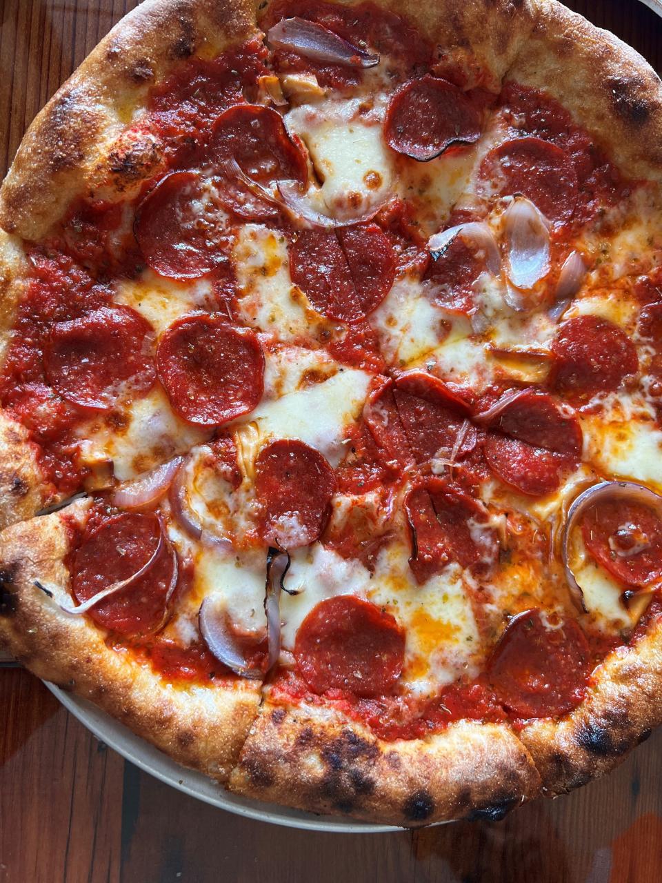 The pepperoni pizza at Ciderhouse Restaurant at Wilson's Orchard in Cumming used smoked mozzarella, shaved onions and Iowa pepperoni.