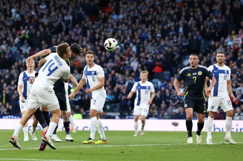 Lawrence Shankland of Scotland scores his team's second goal