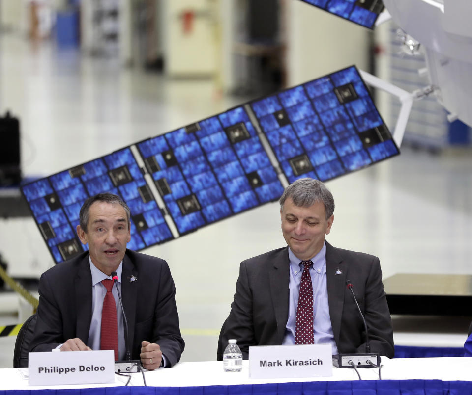 Philippe Deloo, left, ESA European Service Module Project Manager for the Orion program speaks as Mark Kirasich, NASA Orion Program Manager listens at a panel discussion at the Kennedy Space Center Friday, Nov. 16, 2018, in Cape Canaveral, Fla., to mark the arrival of a service module, that will propel NASA's Orion capsule to the moon. (AP Photo/John Raoux)