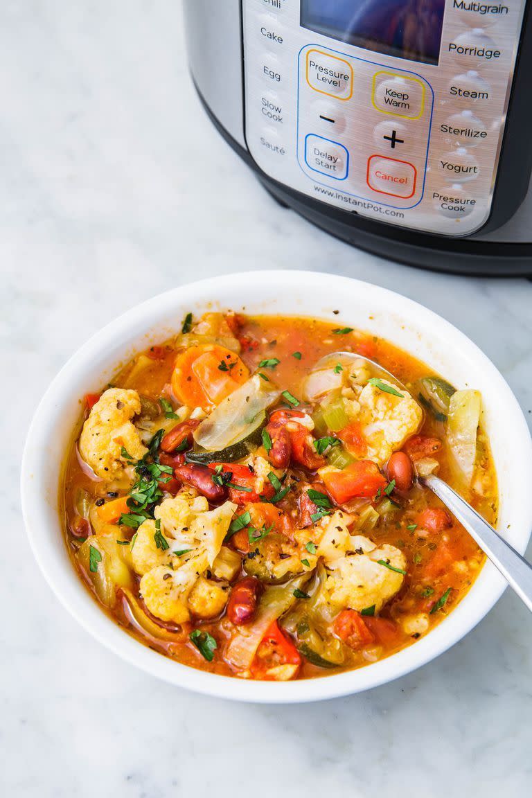 <p>Loaded with cabbage, cauliflower, bell pepper, and courgette, this vegetable soup is a healthy way to warm up this winter. </p><p>Get the <a href="https://www.delish.com/uk/cooking/recipes/a30542736/instant-pot-vegetable-soup/" rel="nofollow noopener" target="_blank" data-ylk="slk:Instant Pot Vegetable Soup;elm:context_link;itc:0;sec:content-canvas" class="link ">Instant Pot Vegetable Soup</a> recipe.</p>