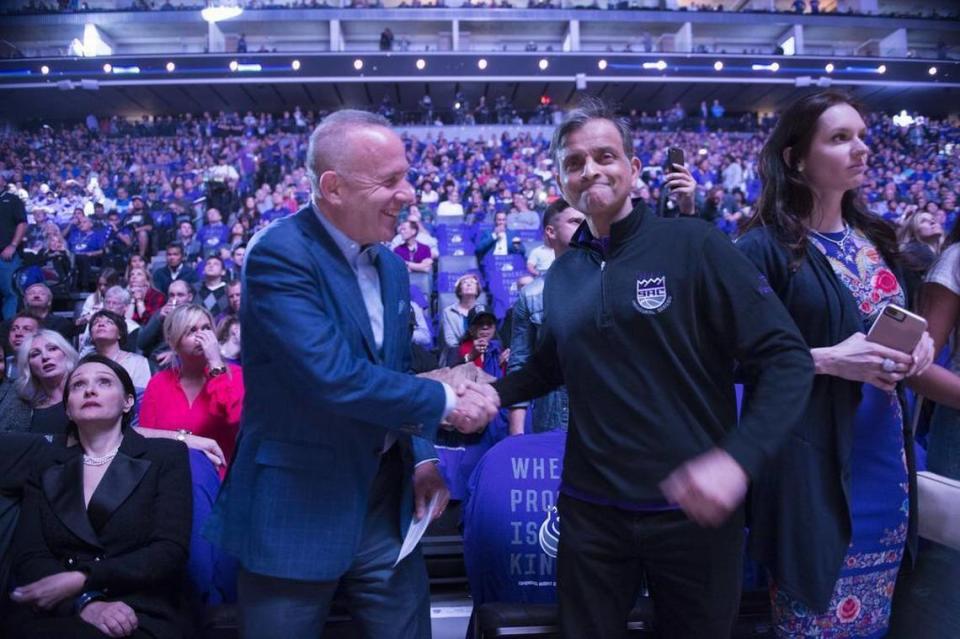 Sacramento Mayor Darrell Steinberg shakes hands with Sacramento Kings majority owner Vivek Ranadive before the Kings season opener against the Houston Rockets on Wednesday at Golden 1 Center.