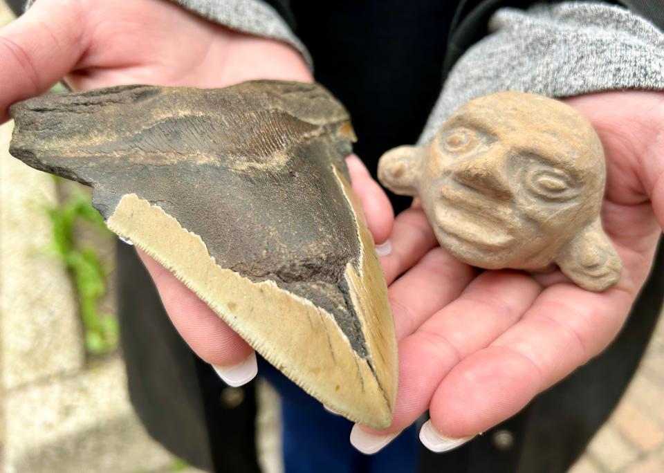 Along with minerals, River Walkers Minerals sells items like megalodon teeth and this Roman effigy that is at least 2,000 years old.