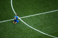 <p>Neymar takes a moment to himself after the Group E match between Brazil and Costa Rica </p>