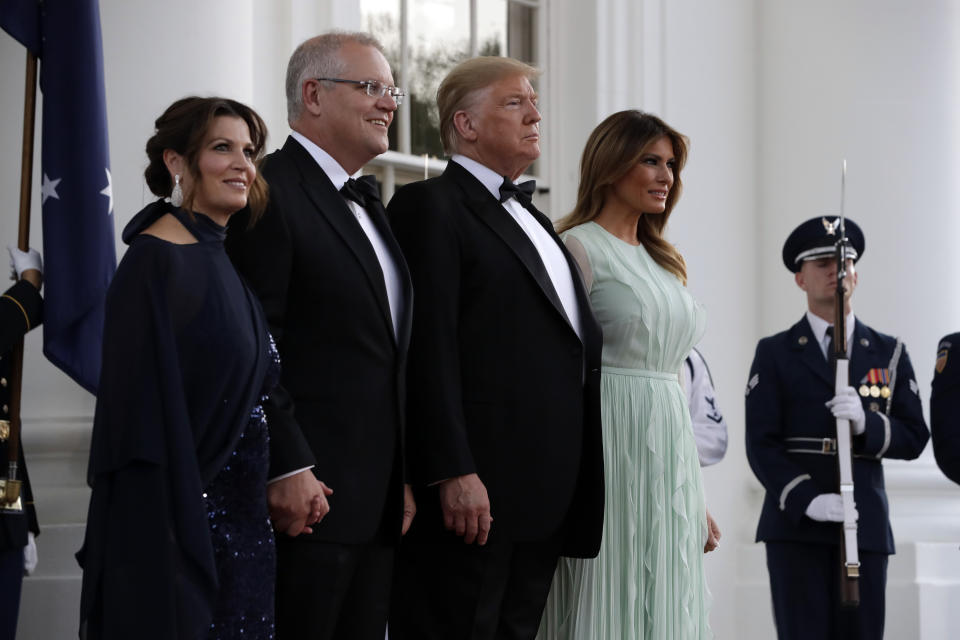 President Donald Trump and first lady Melania Trump welcome Australian Prime Minister Scott Morrison and his wife Jenny Morrison during for a State Dinner at the White House, Friday, Sept. 20, 2019, Washington. (AP Photo/Evan Vucci)