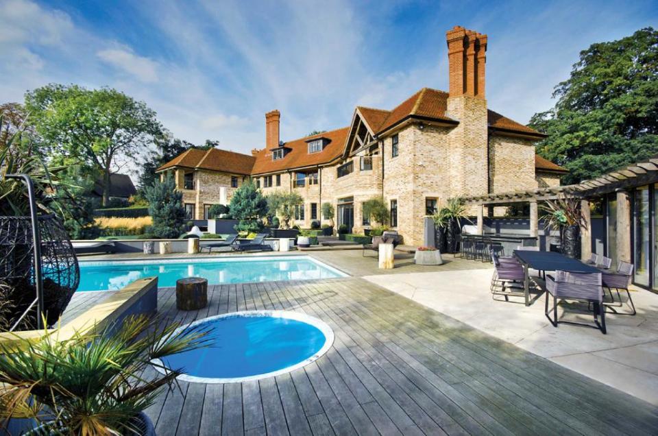 This luxurious estate in north London comes with a gymnasium, ten pin bowling lane, heated swimming pool, cinema room and 8 bedrooms. Photo: Rightmove 