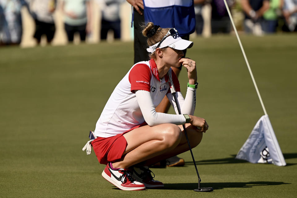 Nelly Korda observes from the eighth green during the final round of the PGA QBE Shootout golf tournament at Tiburon Golf Club, Sunday, Dec. 11, 2022, in Naples, Fla. (AP Photo/Chris Tilley)