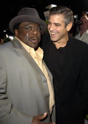 Cedric The Entertainer and George Clooney at the LA premiere of Universal's Intolerable Cruelty