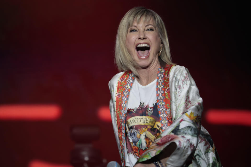 SYDNEY, AUSTRALIA - FEBRUARY 16: Olivia Newton-John performs during Fire Fight Australia at ANZ Stadium on February 16, 2020 in Sydney, Australia. (Photo by Cole Bennetts/Getty Images)