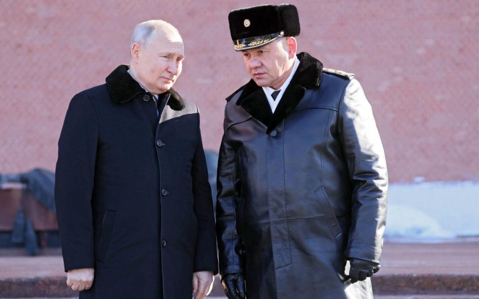 Russian President Vladimir Putin (L) and Russian Defence Minister Sergei Shoigu - MIKHAIL METZEL/Sputnik/AFP via Getty Images