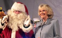 <p>Camilla, Duchess of Cornwall switches on the Christmas lights in Bath, England, with Santa by her side.</p>