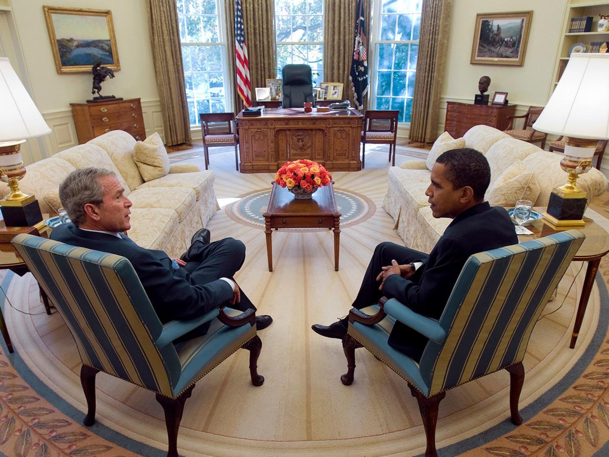 Outgoing President George W. Bush meets with President-elect Obama in the Oval Office on November 10, 2008.