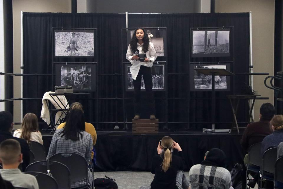 Angelina Castellanos from Dinuba High School performs "Lewis Hine: The Debate of Child Labor and the Diplomacy that Followed" during the National History Day competition award ceremony Tuesday. Castellanos' performance was one of two that won "Best of Event."