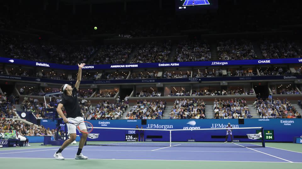 Taylor Fritz serves against Frances Tiafoe during their semifinal. - Matthew Stockman/Getty Images