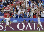 United States' Megan Rapinoe, left, celebrates with United States' Alex Morgan, right, after scoring her side's opening goal during the Women's World Cup final soccer match between US and The Netherlands at the Stade de Lyon in Decines, outside Lyon, France, Sunday, July 7, 2019. (AP Photo/Alessandra Tarantino)