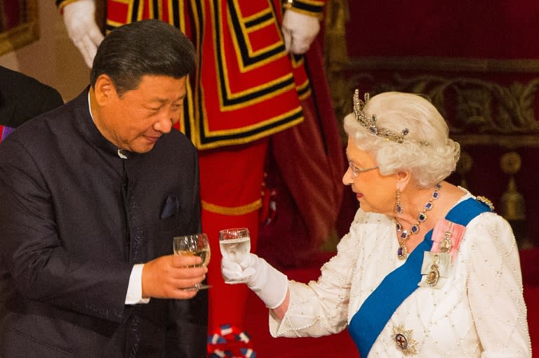 Britain's Queen Elizabeth II hosts a State Banquet for Chinese President Xi Jinping, at Buckingham Palace in London, on October 20, 2015