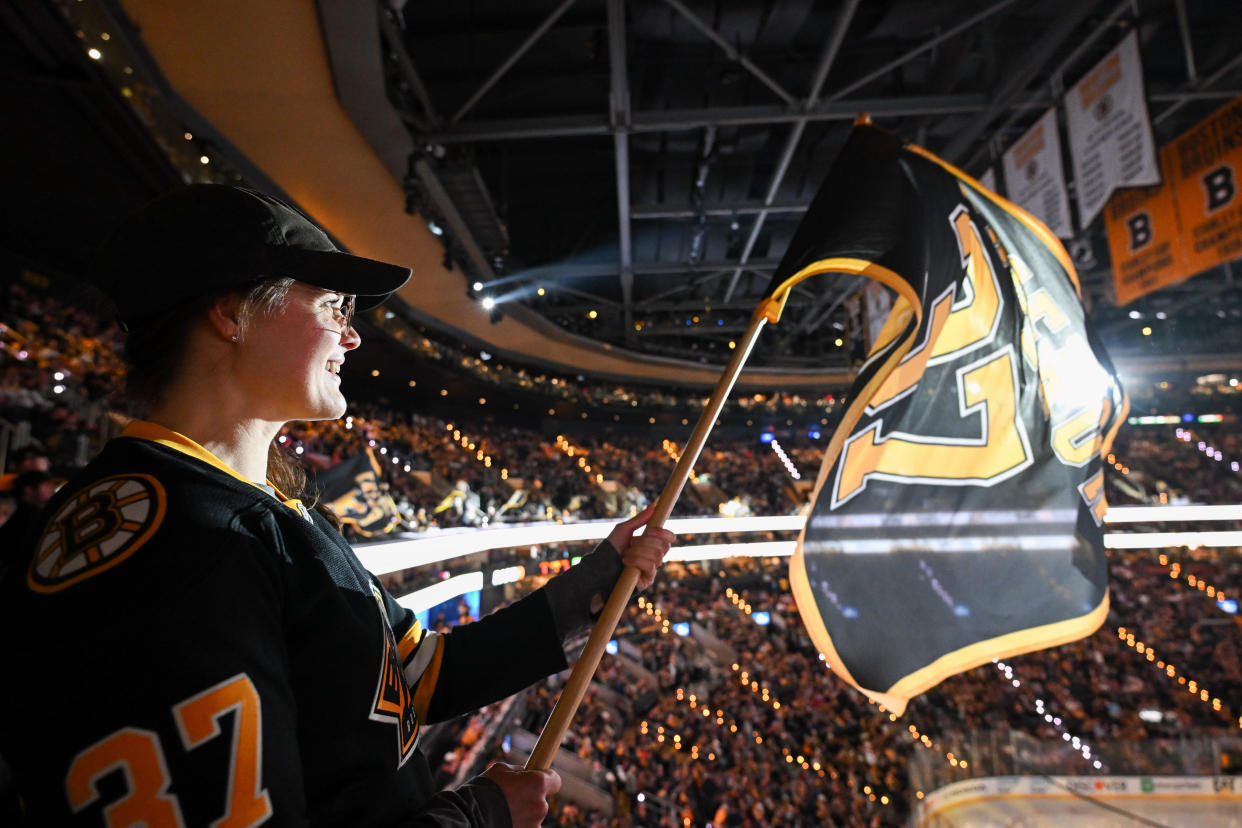 A Boston Bruins fan waves a flag before Game 1 of the first round of the 2023 Stanley Cup Playoffs against the Florida Panthers at TD Garden in Boston on Monday. (Brian Fluharty-USA TODAY Sports)