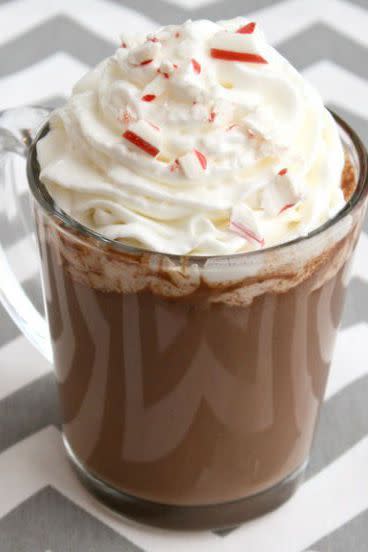 <p>It doesn't get any more festive than hot chocolate and peppermint. Combine the two and add crème de menthe or vodka for this comforting drink.</p><p><strong><em><a href="https://www.womansday.com/food-recipes/food-drinks/recipes/a39759/slow-cooker-peppermint-bark-hot-chocolate-recipe-ghk1213/" rel="nofollow noopener" target="_blank" data-ylk="slk:Get the Slow-Cooker Peppermint Bark Hot Chocolate recipe.;elm:context_link;itc:0;sec:content-canvas" class="link ">Get the Slow-Cooker Peppermint Bark Hot Chocolate recipe.</a></em></strong></p>