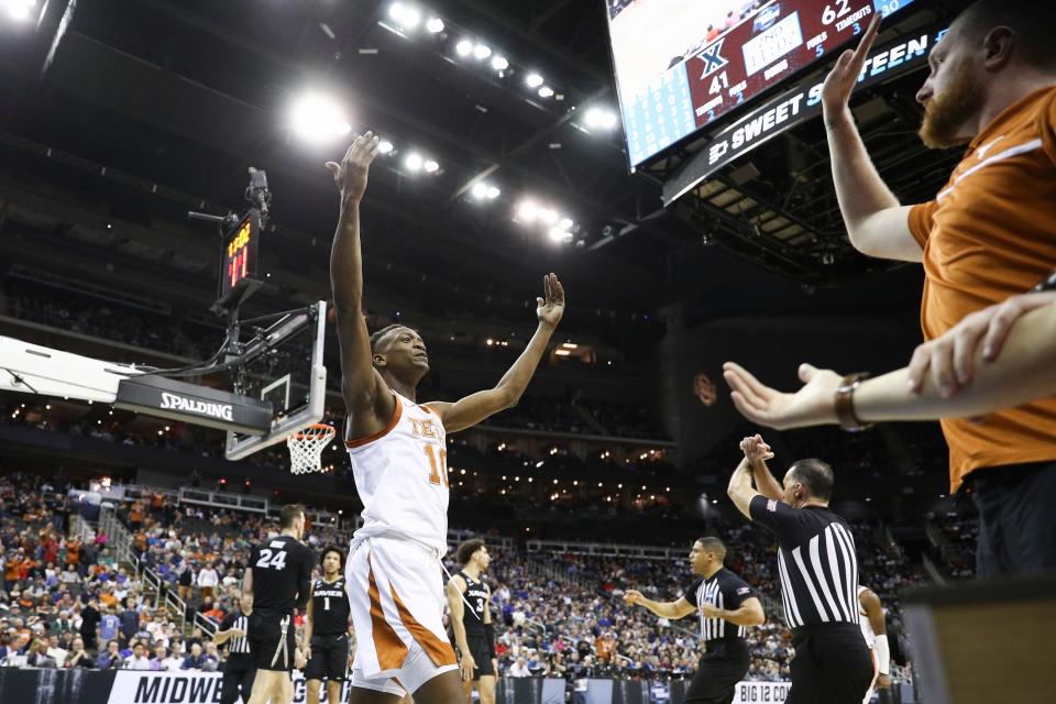 Texas guard Jabari Rice reacts after drawing a foul during the NCAA Tournament Sweet 16 victory over Xavier. Rice hopes to reach new heights after signing a two-way contract with the San Antonio Spurs.