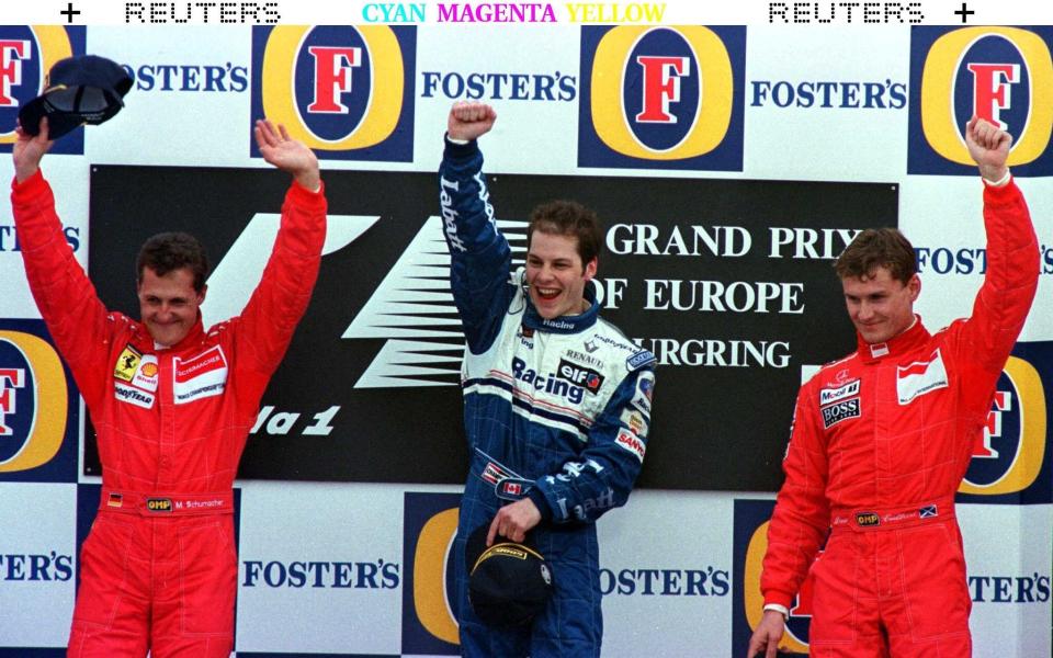 Jacques Villeneuve celebrates victory at the European Grand Prix - REUTERS