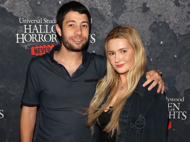 <p>Rich Polk/Getty</p> Ira Kunyansky and Abigail Breslin attend the "Halloween Horror Nights" Opening Night at Universal Studios Hollywood on September 09, 2021.