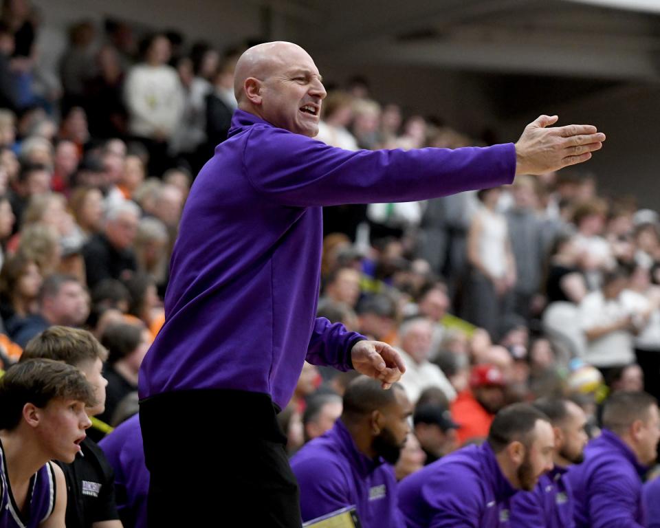 Jackson head coach Tim Debevec yells to players in the first quarter of Jackson at Green boys basketball. Friday, December 8, 2023.