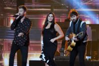 <p>Charles Kelley, Hillary Scott, and Dave Haywood of Lady Antebellum perform onstage at the 51st annual CMA Awards at the Bridgestone Arena on November 8, 2017 in Nashville, Tennessee. (Photo by Rick Diamond/Getty Images) </p>