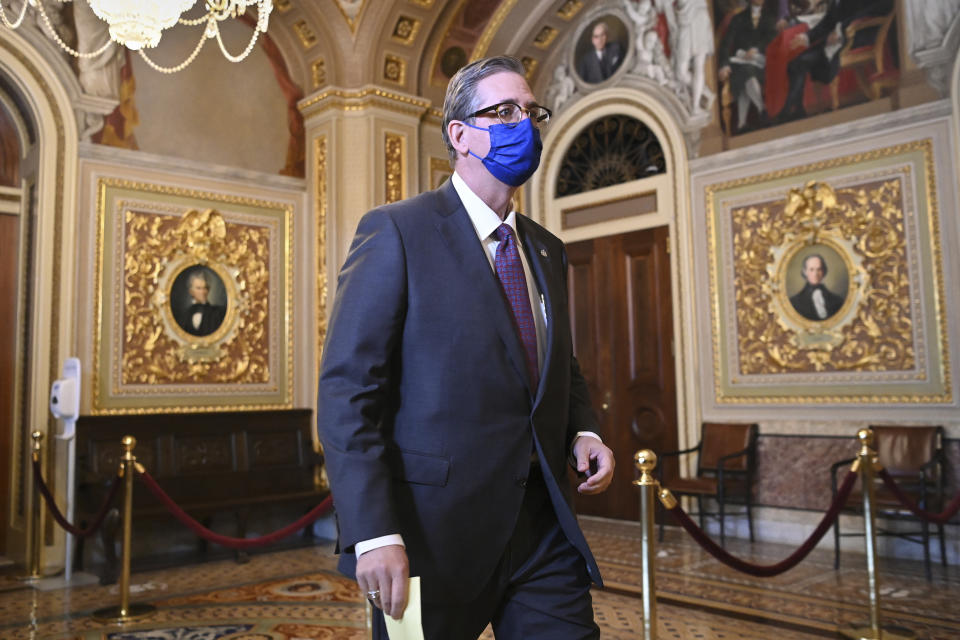 Bruce Castor, lawyer for former President Donald Trump, walks on Capitol Hill during the third day of the second impeachment trial of Trump in the Senate, at the Capitol, Thursday, Feb. 11, 2021, in Washington. (Mandel Ngan/Pool via AP)