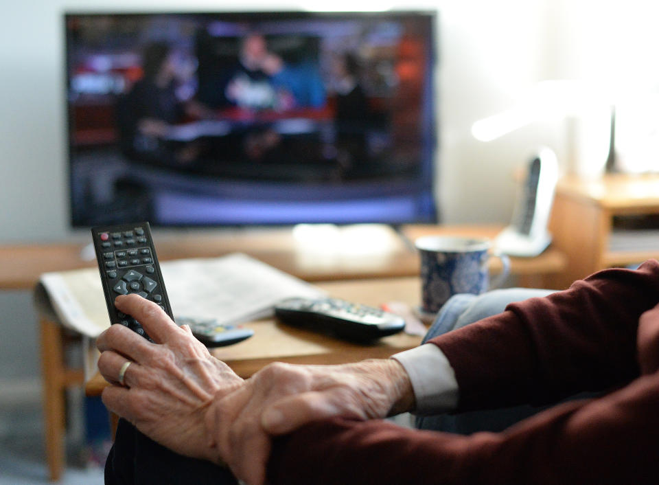 Generic old person watching TV. TV Licensing customers over 75 will remain covered by a free TV licence until 31 May 2020. PA Photo. Picture date: Wednesday January 15, 2020. Following the BBC's policy announcement on the future of the over 75s TV Licence fee, TV Licensing is advising customers currently receiving a free licence that they need not take any immediate action and that they will be supported through the changes when the current arrangement for free over 75 licences paid for by the UK Government comes to an end next year. Further to a public consultation, the BBC has announced that from June next year the BBC will fund a free licence for over 75s in receipt of Pension Credit. Photo credit should read: Nick Ansell/PA Wire (Photo by Nick Ansell/PA Images via Getty Images)