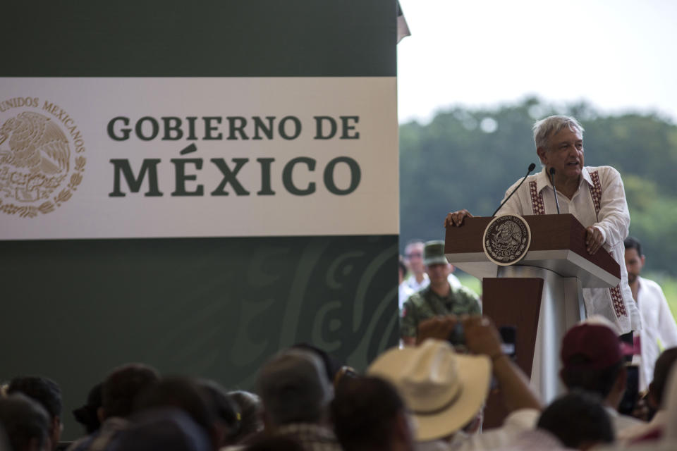 Mexican President Andres Manuel Lopez Obrador gives a speech as he visits a plant nursery inside a military nature reserve, during an event with El Salvadorian President Nayib Bukele, not in picture, near the border town of Tapachula, Mexico, Thursday, June 20, 2019. Lopez Obrador met with El Salvador's president to discuss a development plan that aims to slow a surge of mostly Central American migrants toward the U.S. border. (AP Photo/Oliver de Ros)