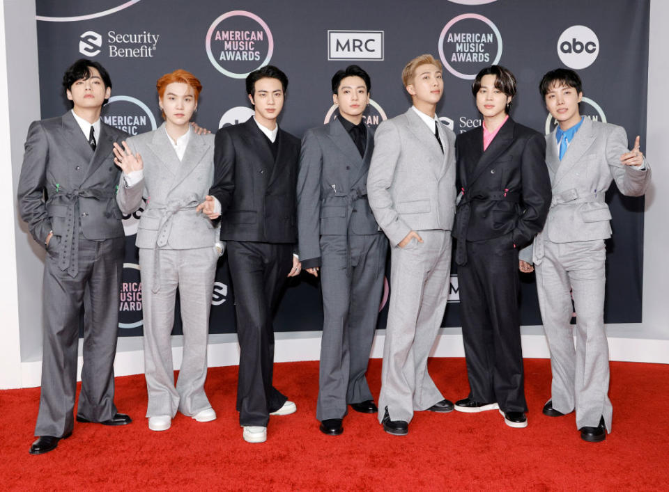 LOS ANGELES, CALIFORNIA - NOVEMBER 21: (L-R) V, Suga, Jin, Jungkook, RM, Jimin, and J-Hope of BTS attend the 2021 American Music Awards at Microsoft Theater on November 21, 2021 in Los Angeles, California. (Photo by Amy Sussman/Getty Images)